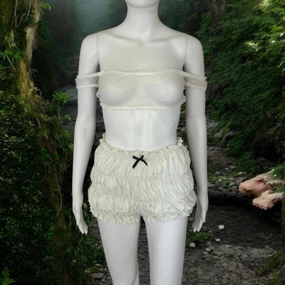 Cream Ruffled Shorts with Black Bow